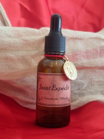 HUILE SAINT EXPEDIT AVEC SA MEDAILLE
